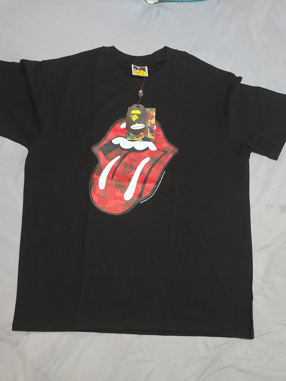 Bape Black Tee with Red Camouflage Tongue Graphic